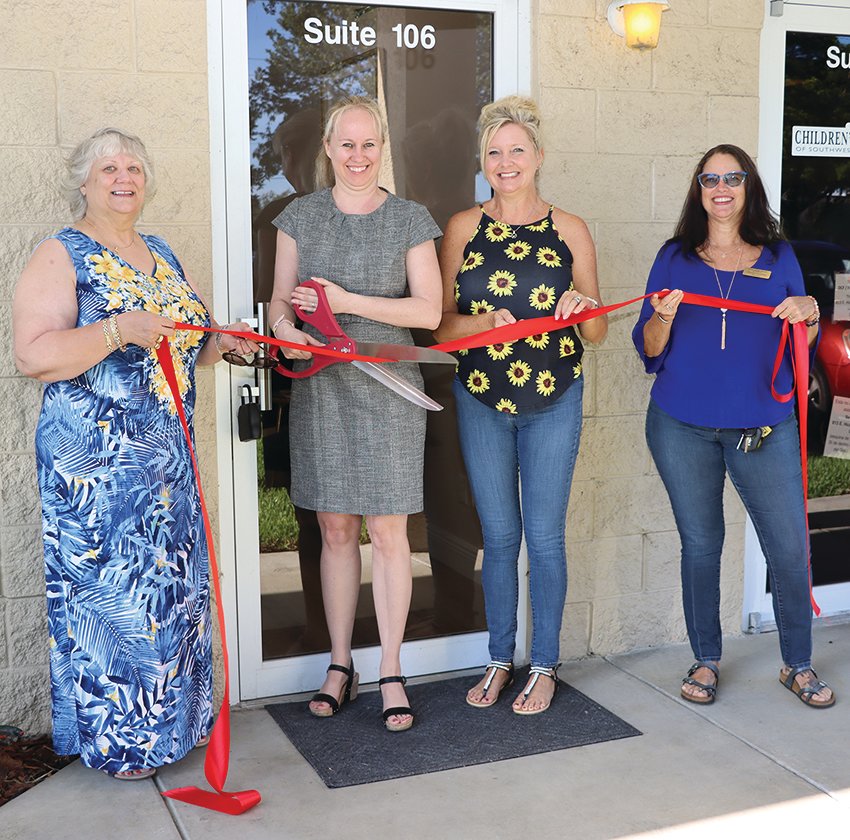 Pictured at the ribbon cutting for Beyond Barriers are from left to right Diane E Fidanza,  Executive Director LaBelle Chamber of Commerce, Charity Williams, CEO of Beyond Barriers, Amanda Nelson, President of the LaBelle Chamber of Commerce and Sherill Overberg, Vice-President of the LaBelle Chamber of Commerce.